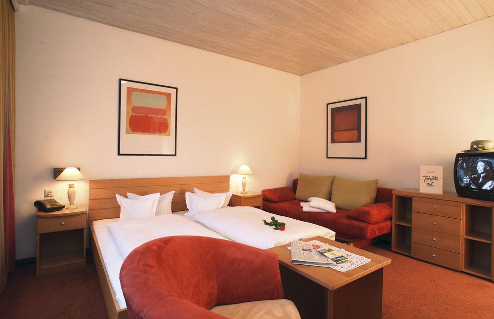 Hotel Alpenresidenz Adler Kirchberg in Tirol Pokoj fotografie