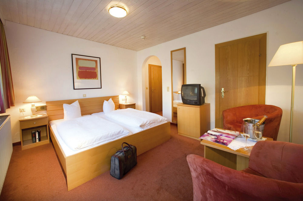 Hotel Alpenresidenz Adler Kirchberg in Tirol Pokoj fotografie